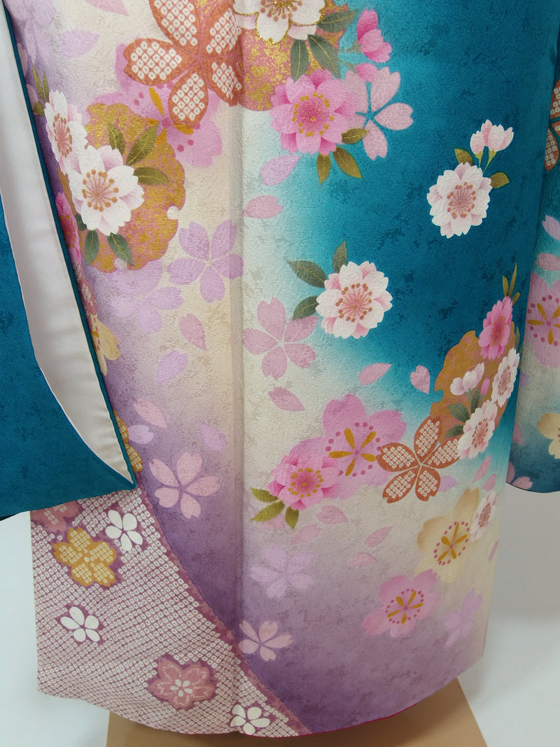 Almost beautiful Luxurious Furisode (long-sleeved kimono), flower pattern, girdle processing, pure silk, blue-green color